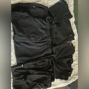 Black scrubs, large, mix of Jannuu, med couture & healing hands. 4 tops, 5 pants